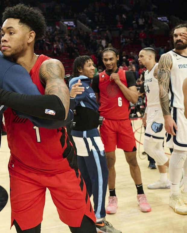Nov 2, 2022; Portland, Oregon, USA; Portland Trail Blazers guard Anfernee Simons (1) congratulates players with the Memphis Grizzlies after a game at Moda Center. The Memphis Grizzlies won the game 111-106. Mandatory Credit: Troy Wayrynen-USA TODAY Sports